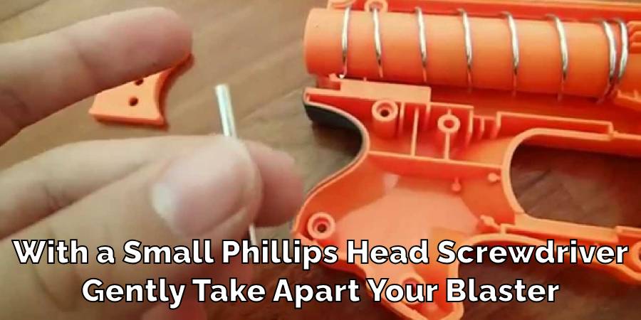 With a Small Phillips Head Screwdriver
Gently Take Apart Your Blaster
